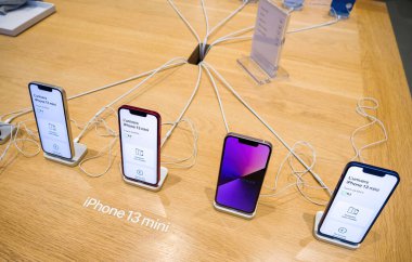 Paris, France - Nov 3, 2021: DIrectly above view close-up macro shot of new latest Apple Computers iPhone smartphone 13 mini