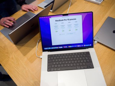 Paris, France - Mar 11, 2021: Above view of new latest Apple Computers MacBook Pro 16 inch powerful laptop computer with M1 silicon and new neural engine GPU