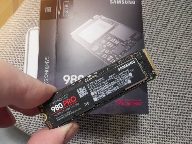 Paris, France - Aug 8, 2022: POV male hand unboxing unpacking new Samsung 980 Pro NVME ss hard disk drive for the personal computer or mac Apple upgrade