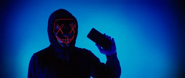 Anonymous Hacker Face Mask Smartphone Hand Man Black Hood Shirt — Stock Photo, Image