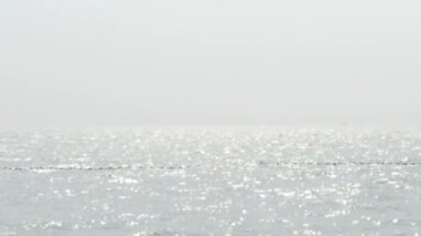 Beach Sand and Sea. Pattaya beach which one of the famous sea locations in Thailand. Represent vacation relaxing. Open country for travelers after Covid 19 pandemic. Sea waves and sand with blue sky.