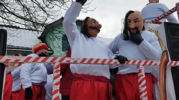 Chernivtsi, Ukraine, January 15, 2020 traditional annual of Christmas winter carnival Malanka Fest 2018 in the Ukrainian city of Chernivtsi. cheerful unusual santa. — Stockvideo