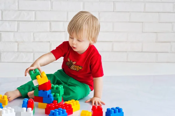 Kid and constructor blocks — Stock Photo, Image