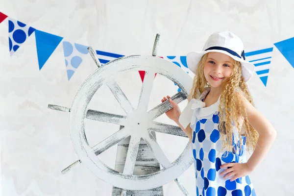 Girl with steer wheel — Stock Photo, Image