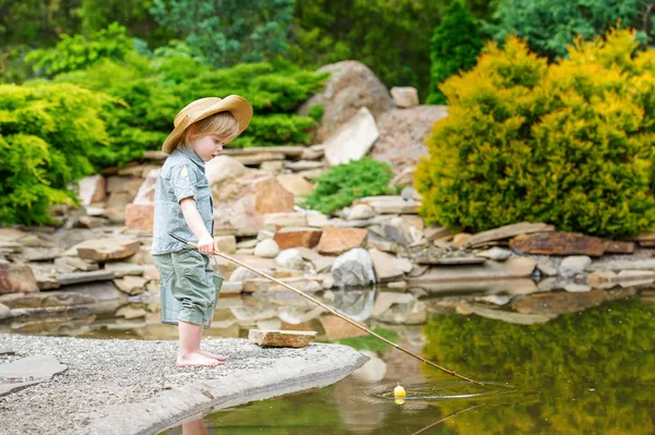 Cute child fishing — Stock Photo, Image