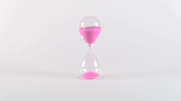 Часы с розовым песком — стоковое видео