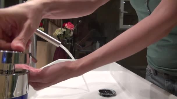 Woman washing her hands indoor — Stock Video