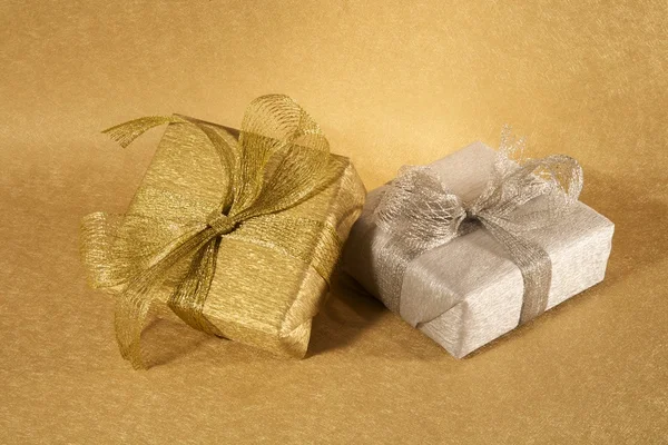 Golden and silver gift boxes — Stock Photo, Image