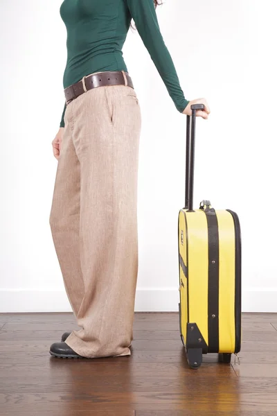 Side woman with yellow suitcase — Stock Photo, Image