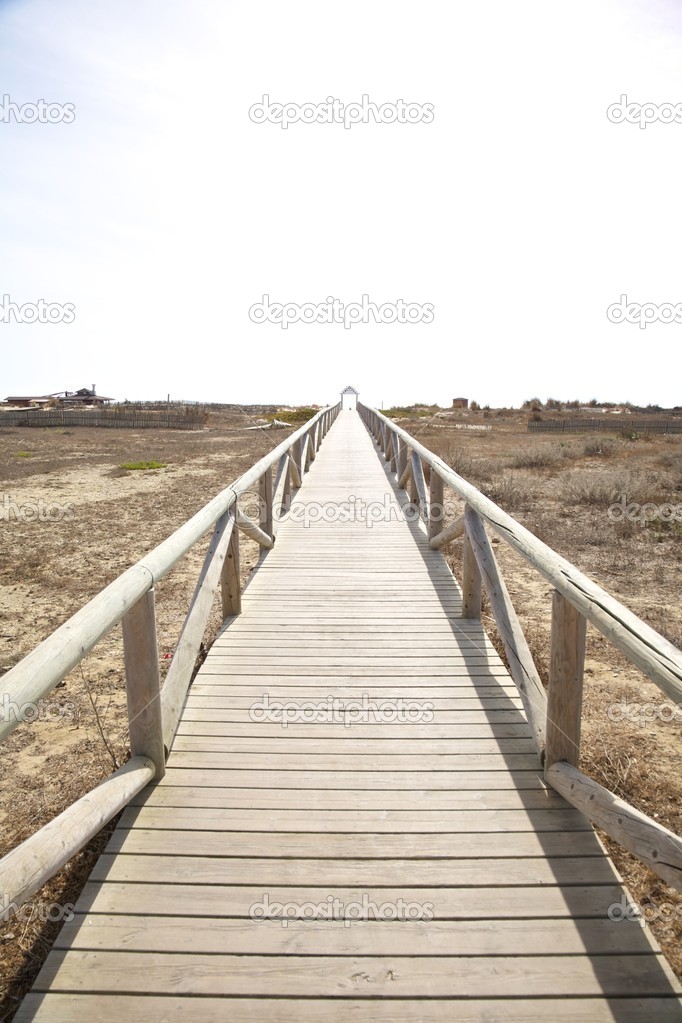 lonely wooden footbridge