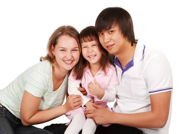 Casual portrait of a healthy, attractive young family — Stock Photo, Image
