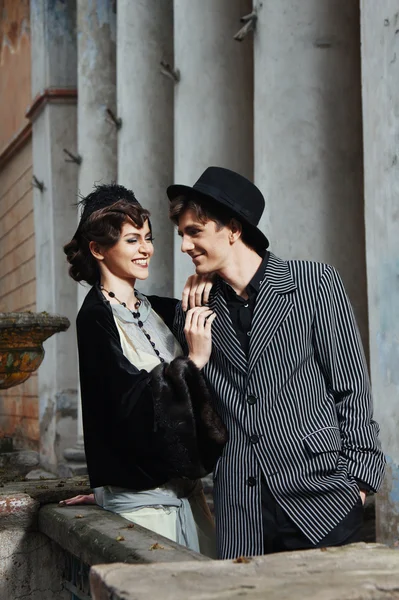 Retro styled fashion portrait of a young couple. Clothing and ma — Stock Photo, Image