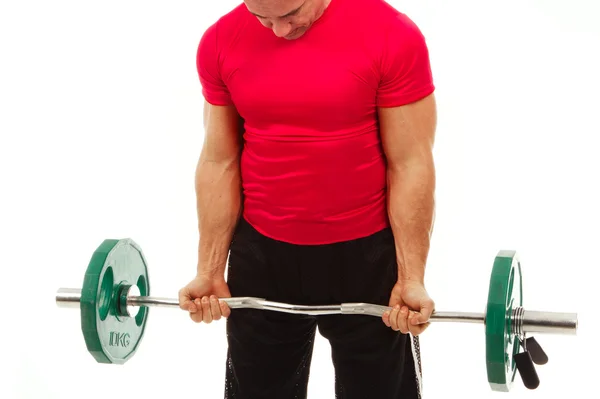 Closeup of a muscular young man lifting weights, isolated on whi — Stock Photo, Image