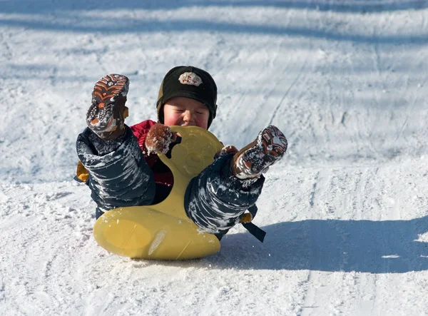 Kid on sled — Stock Photo, Image