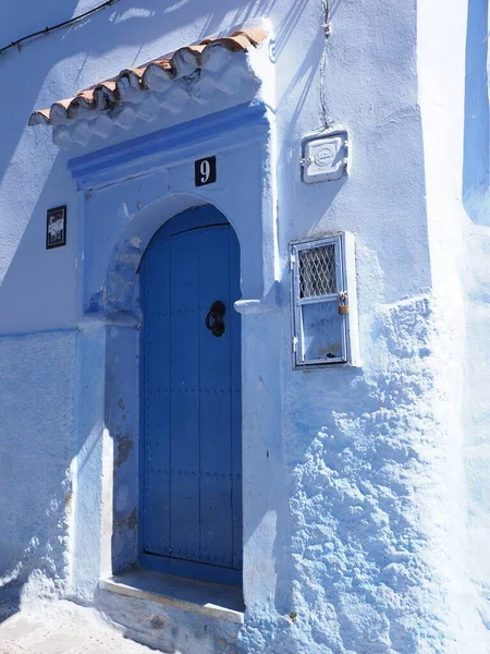 Islamic eave over door at african Chefchaouen town in Morocco in 2019 warm sunny spring day on April - vertical