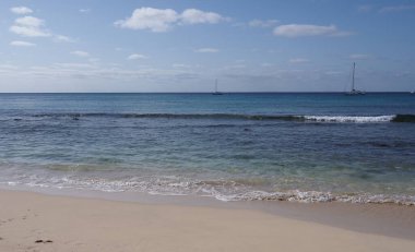 Desolate Atlantic Ocean in african Santa Maria town at Sal island in Cape Verde, clear blue sky in 2019 warm sunny spring day on April.