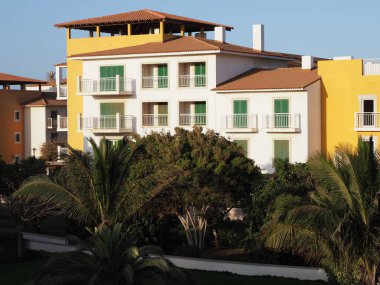 Complex in resort oin african Santa Maria town on Sal island in Cape Verde, clear blue sky in 2019 hot sunny spring day on April.