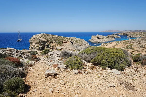 Toll ship and crystal lagoon on european Comino island in Malta