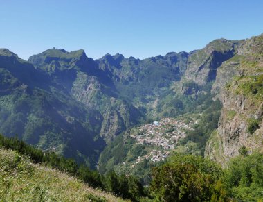 European Curral das Freiras village in nuns valley on Madeira island in Portugal, clear blue sky in 2022 warm sunny spring day on June.
