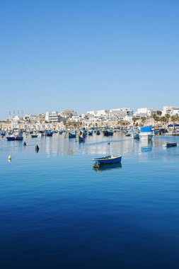 View of european Marsaxlokk village in Malta - vertical