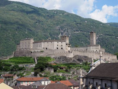 Townscape with castel grande in european Bellinzona city at canton Ticino in Switzerland, clear blue sky in 2017 warm sunny summer day on July.