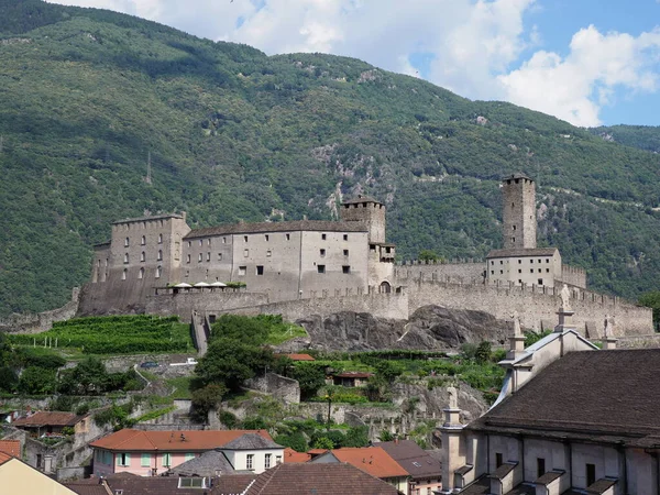 Townscape with castel grande in european Bellinzona city at canton Ticino in Switzerland, clear blue sky in 2017 warm sunny summer day on July.