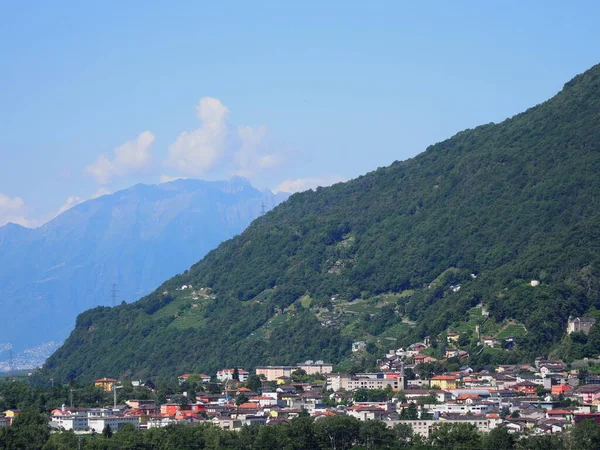 Alps near european Bellinzona city, capital of canton Ticino in Switzerland, clear blue sky in 2017 warm sunny summer day on July.