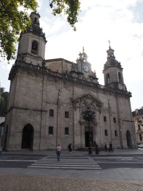 Church San Nicolas de Bari in european Bilbao city at Biscay province in Spain, clear blue sky in 2019 warm sunny summer day on September - vertical