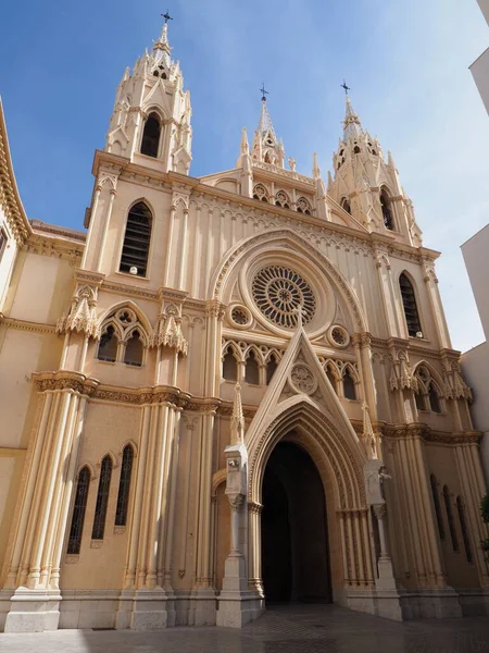 Elevation of sacred heart church at Malaga european city in Andalusia region in Spain, clear blue sky in 2019 warm sunny spring day on April vertical