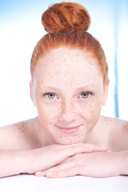 Portrait of an attractive freckled girl clipart