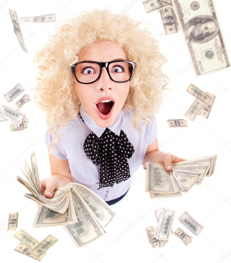 Young woman with dollars in her hands