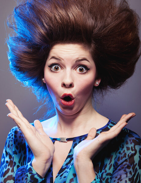 Portrait of an attractive surprised young woman