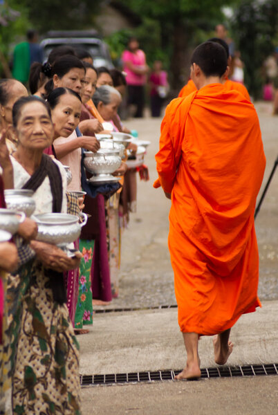 Buddhist monks at their morning almsround