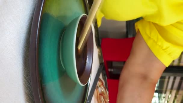 Caucasian Woman Pouring Soy Sauce Bowl Asian Food Restaurant High — Video