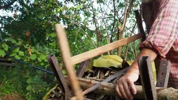 Man Saws Log Hand Saw Farm Outdoor Work Life Away — Stock Video