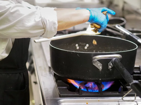 chef at work in hotel industrial. kitchen