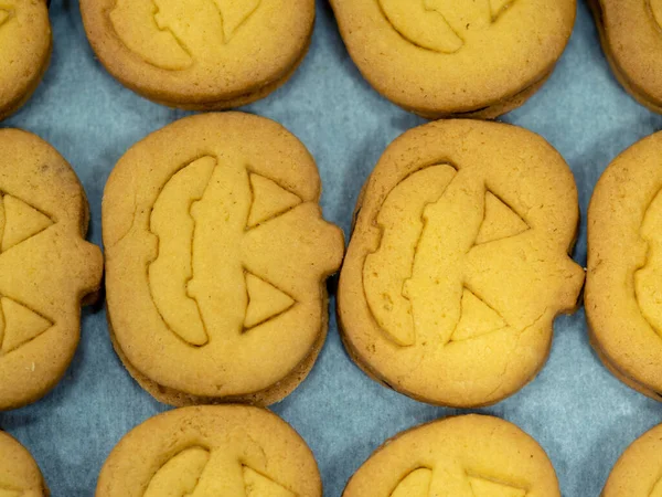 preparing sweet yellow cookies in the bakery