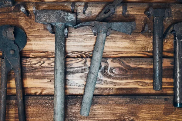 Old Rusty Blacksmith Tools Hung Wooden Wall — Stock Photo, Image