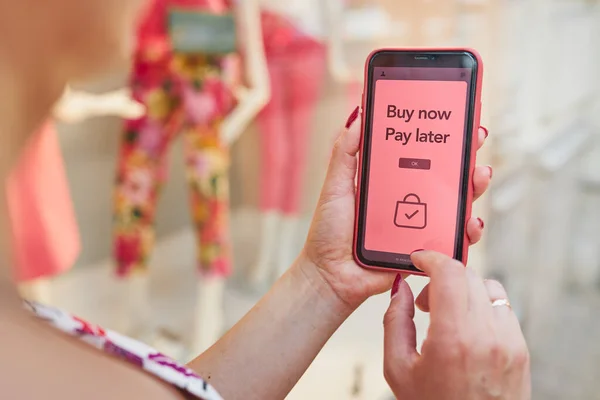 BNPL Buy now pay later online shopping service on smartphone. Online shopping. Paying after delivery. Complete the payment after purchase at no added cost. Payment after credit check. Easy way to shop online. Afterpay service