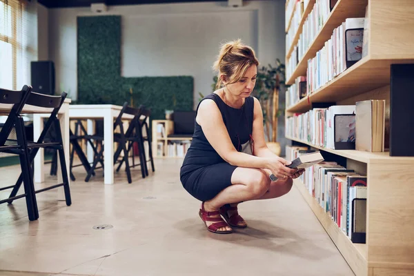 Woman Choosing Book Public Library Selecting Books Searching Literature Reading —  Fotos de Stock