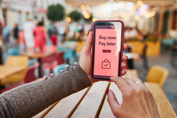 BNPL Buy now pay later online shopping service on smartphone. Online shopping. Paying after delivery. Complete the payment after purchase at no added cost. Payment after credit check. Easy way to shop online. Afterpay service