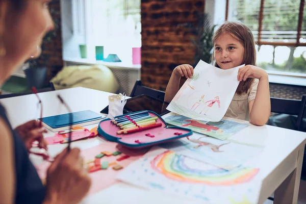 Girl Presenting Her Artwork Teacher Woman Assisting Schoolgirl Classes Primary — Stock Photo, Image