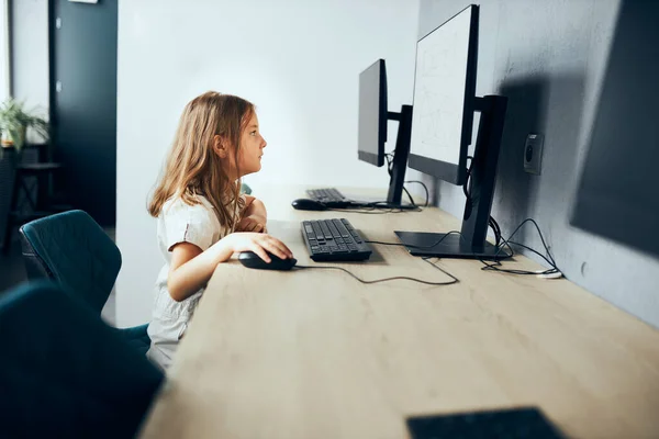 Engaged Absorbed Schoolgirl Learning Use Technology Classroom Primary School Child — Stockfoto