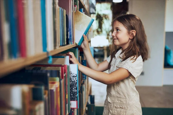 Schoolgirl Choosing Book School Library Smart Girl Selecting Literature Reading — Stockfoto