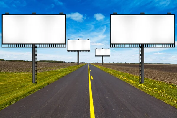 Billboard na estrada do país — Fotografia de Stock