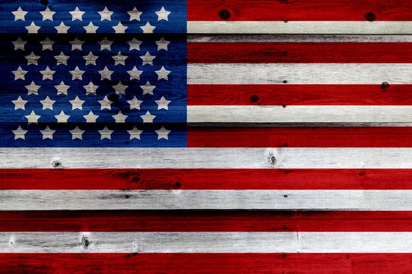 Bandeira americana pintada velha na cerca de madeira escura — Fotografia de Stock