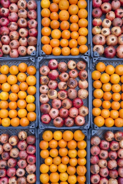 Pomegranates and oranges — Zdjęcie stockowe