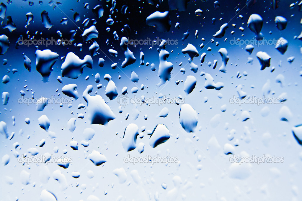 Raindrops on blue glass