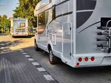 White caravan camper travel car on campsite