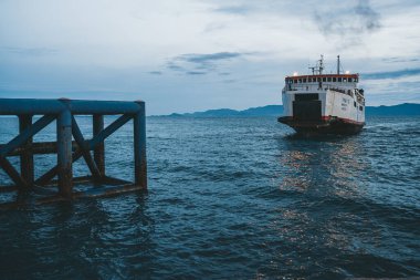 Koh Phangan, Thailand - 11 September 2020: Raja ferry boat a Thong Sala pier at sunset